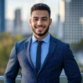 Confident businessman in a suit smiling on a balcony with city skyline Confident businessman in a suit smiling on a balcony with city skyline